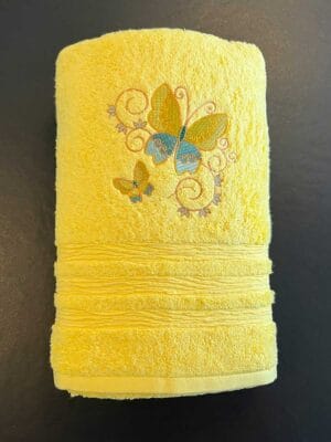 Vezen brisača rumen Metulj